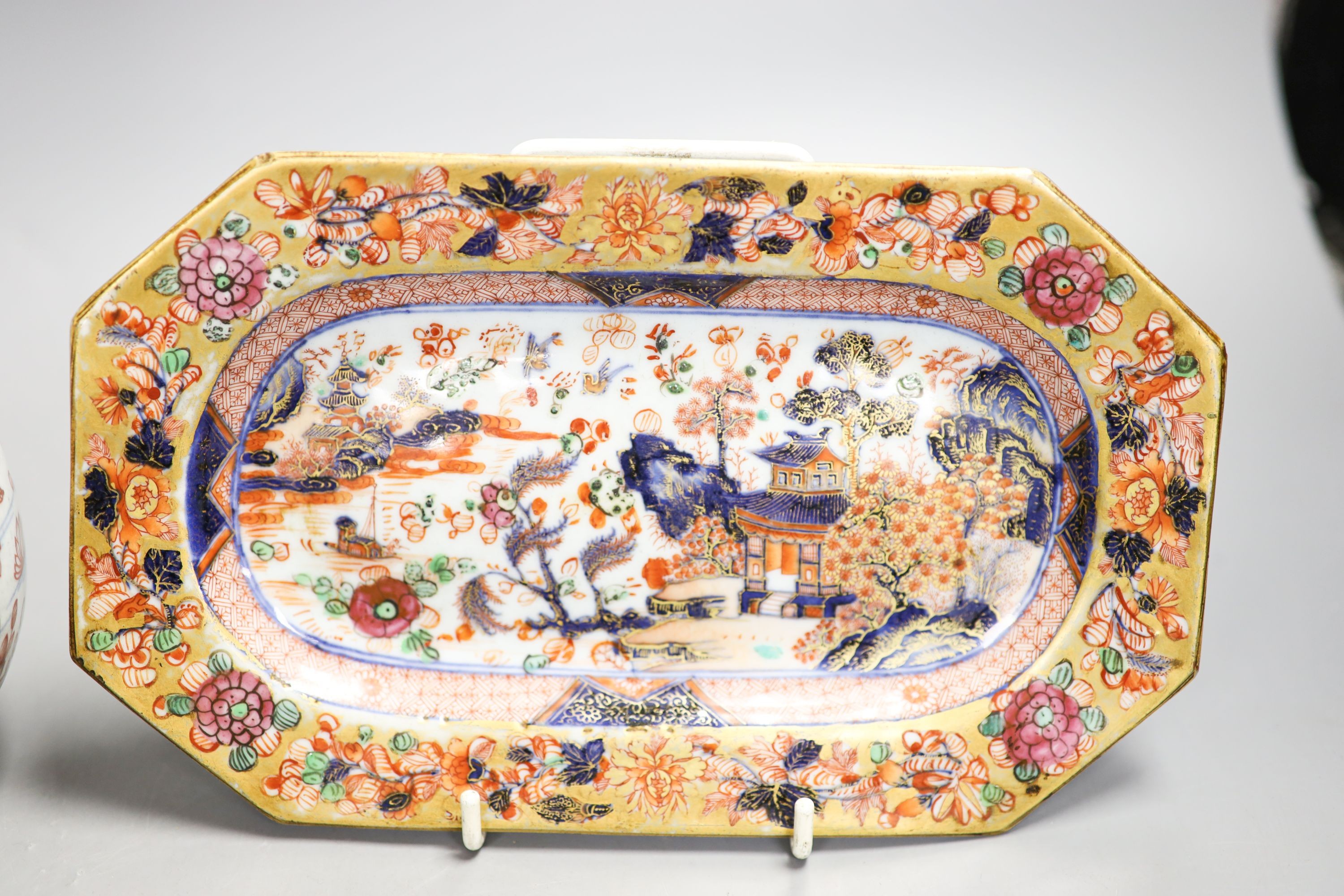 A Chinese clobbered blue and white bottle and a similar canted rectangular dish, 18th/19th century